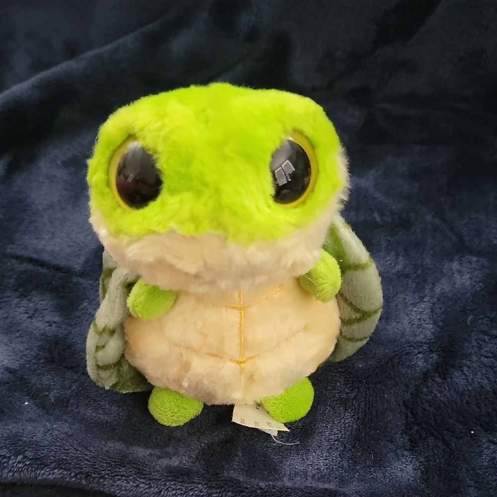 Green and Cream Stuffed Turtle Toy with Friendly Features